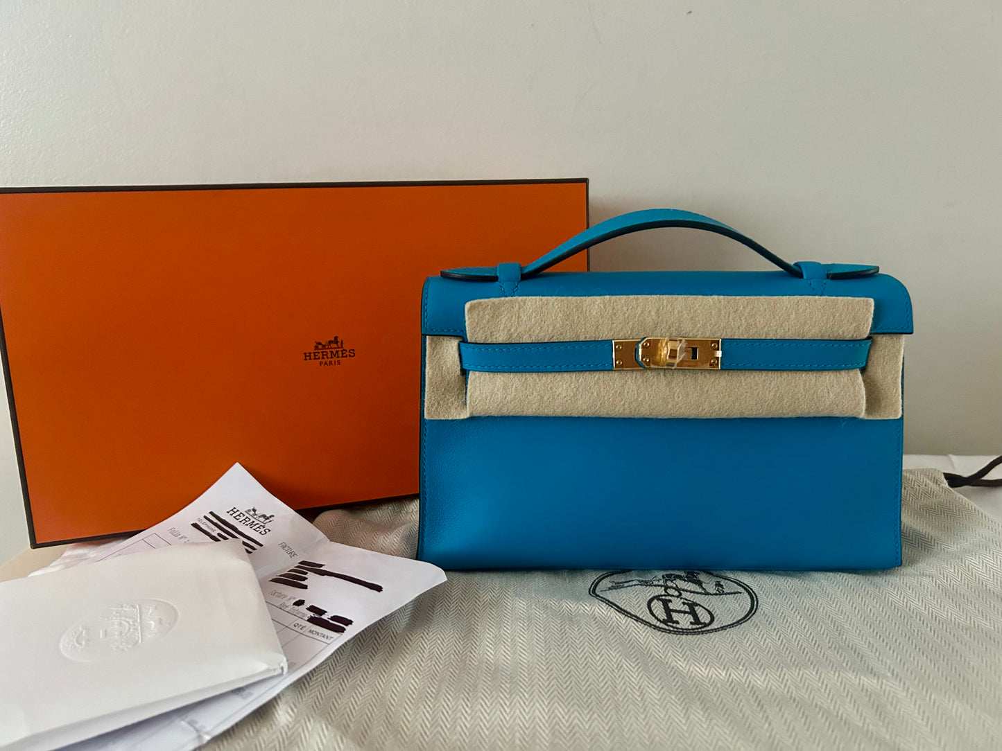HERMES Kelly Pochette Bleu Frida Swift Leather Gold Hardware
