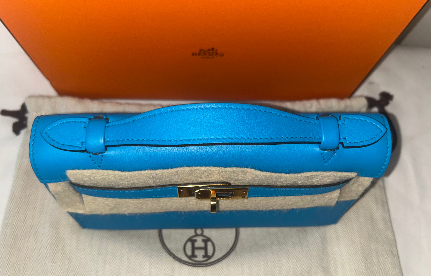 HERMÈS Kelly Pochette Bleu Zanzibar Swift Leather Gold Hardware Stamp A