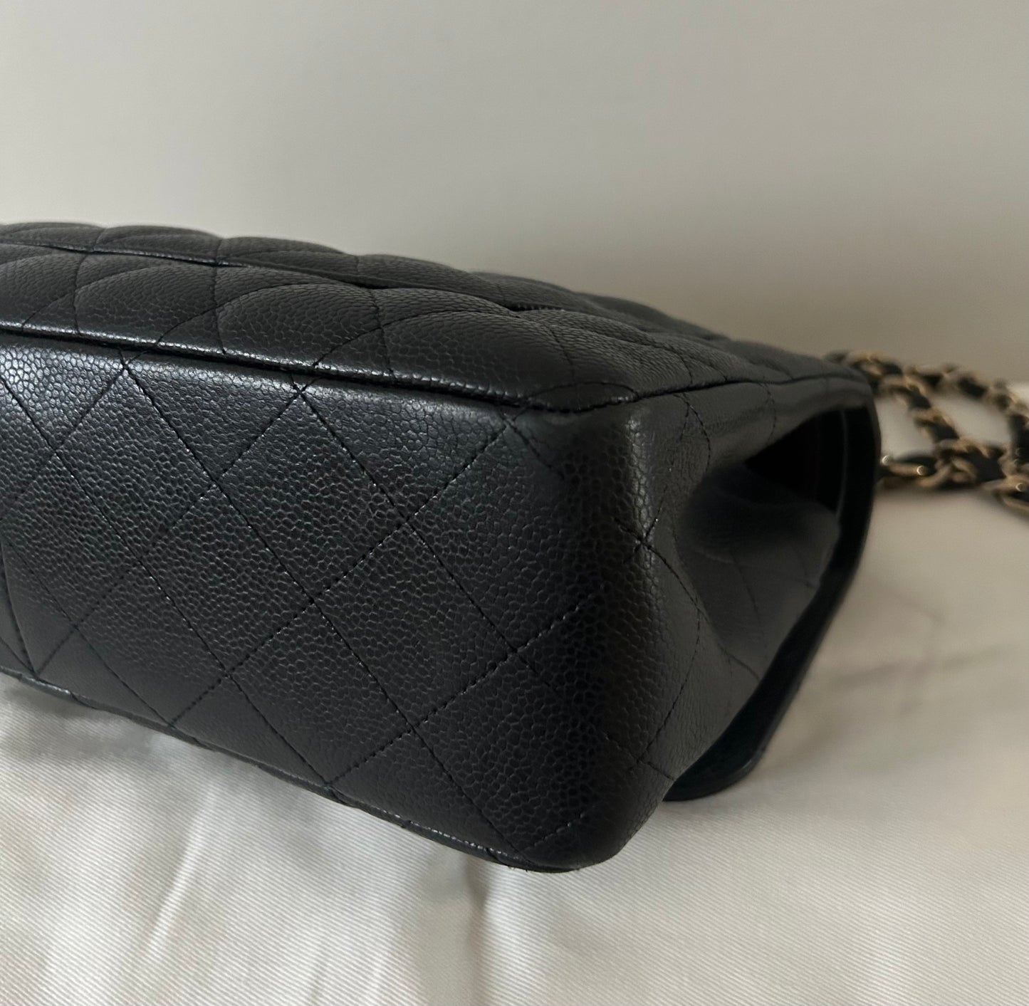 CHANEL Classic Jumbo Double Flap Quilted Caviar Leather Handbag Black/Gold