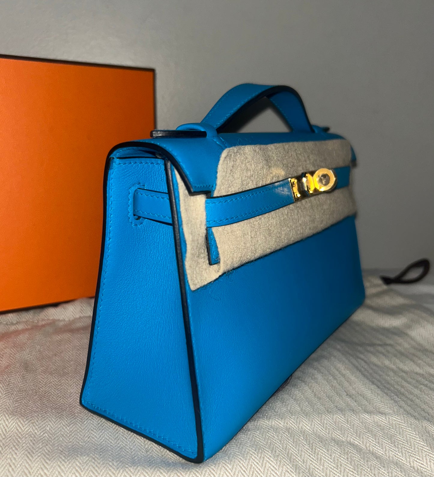 HERMES Kelly Pochette Bleu Frida Swift Leather Gold Hardware