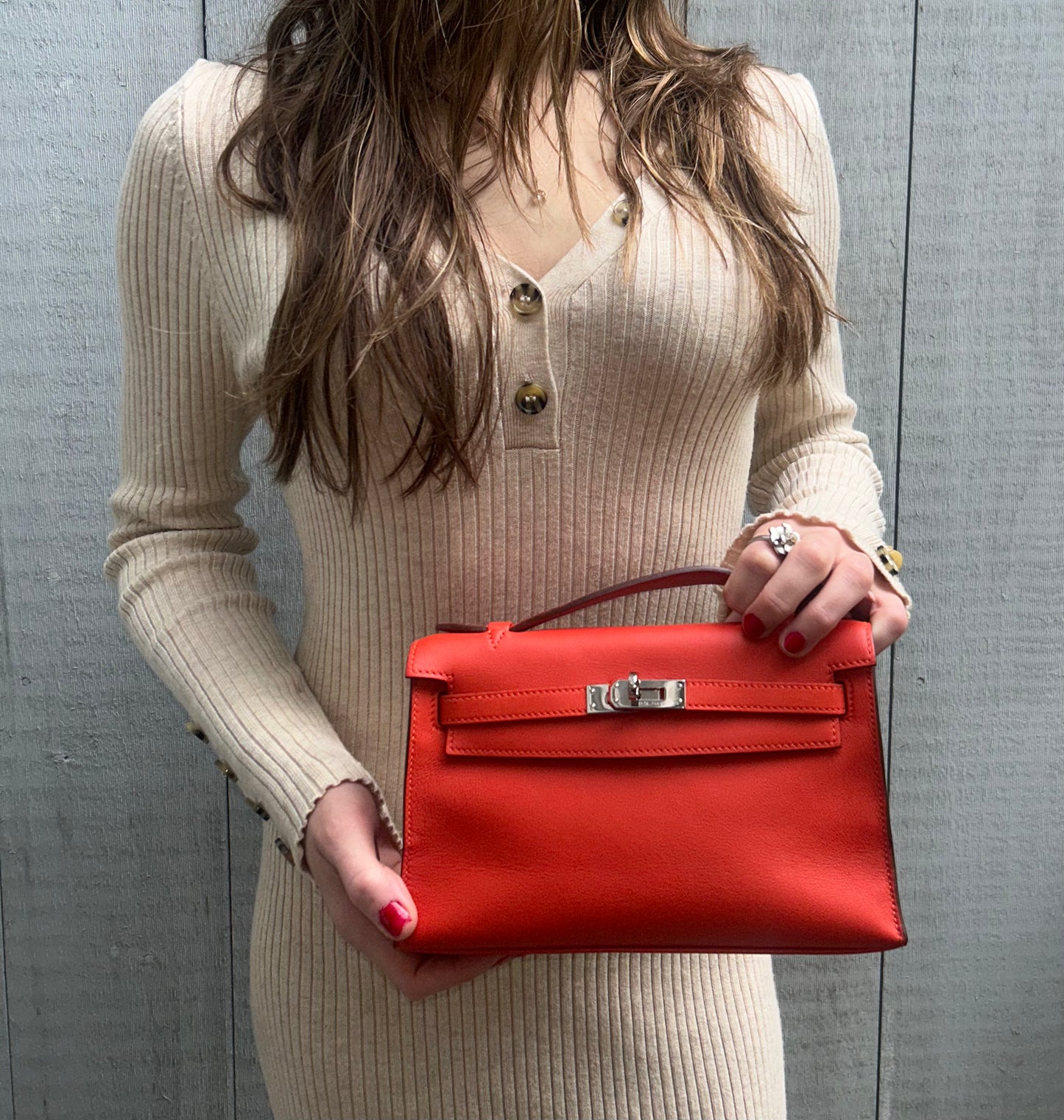 HERMÈS Kelly Pochette Capucine Swift Leather Palladium Hardware
