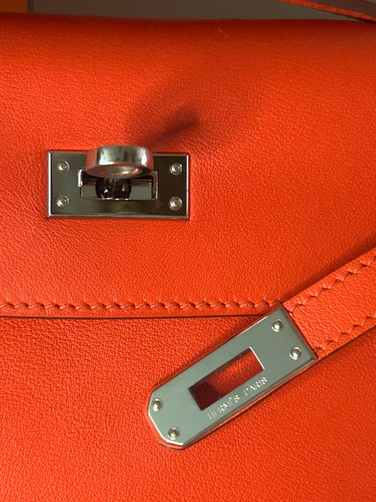 HERMÈS Kelly Pochette Capucine Swift Leather Palladium Hardware