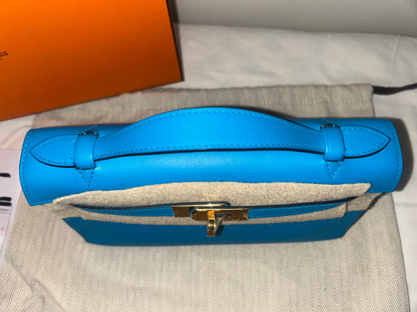 HERMES Kelly Pochette Bleu Frida Swift Leather Gold Hardware