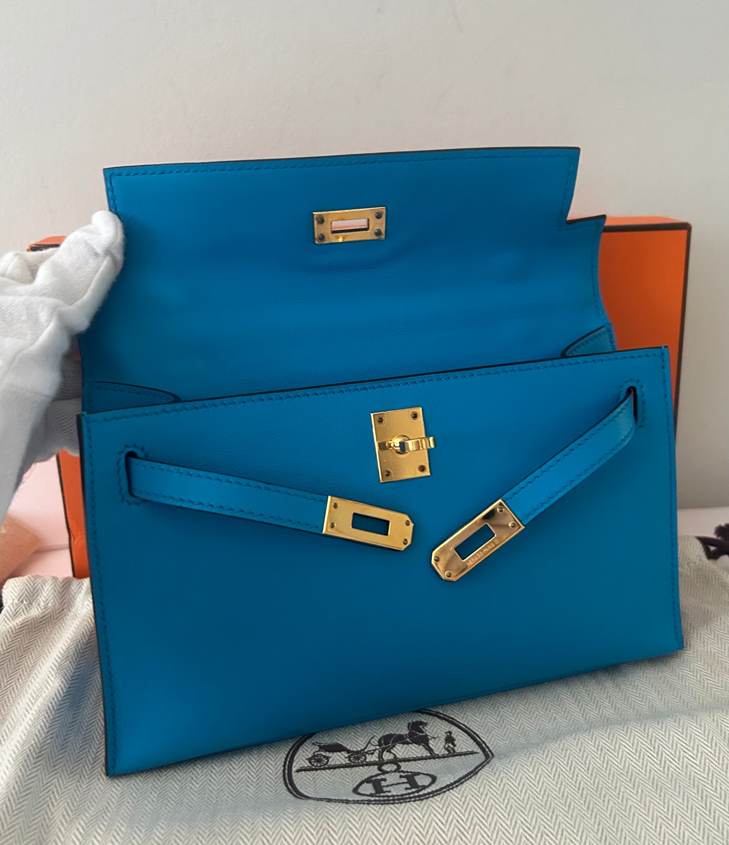 HERMÈS Kelly Pochette Bleu Zanzibar Swift Leather Gold Hardware Stamp A