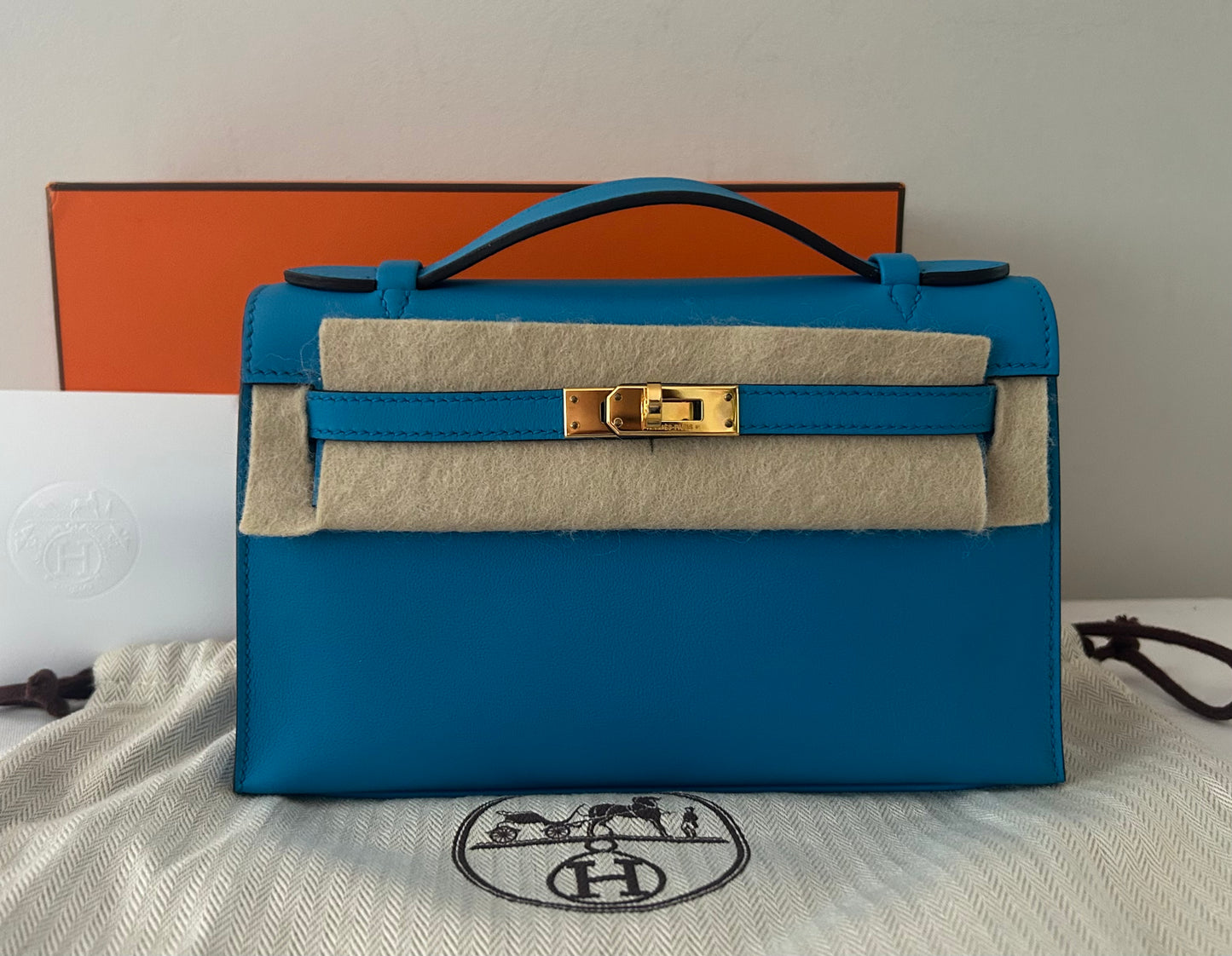 HERMÈS Kelly Pochette Bleu Zanzibar Swift Leather Gold Hardware Stamp A