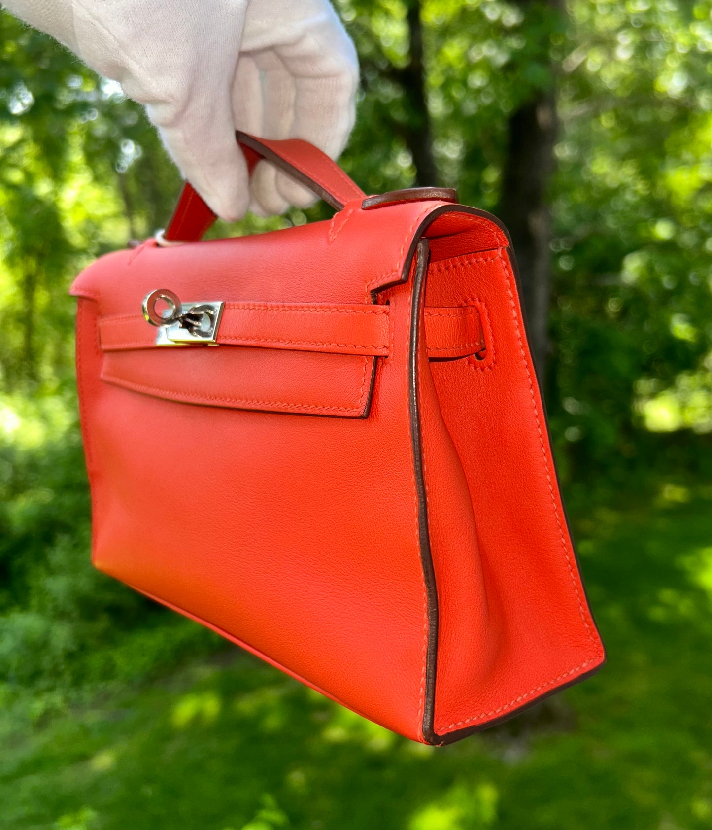 HERMÈS Kelly Pochette Capucine Swift Leather Palladium Hardware