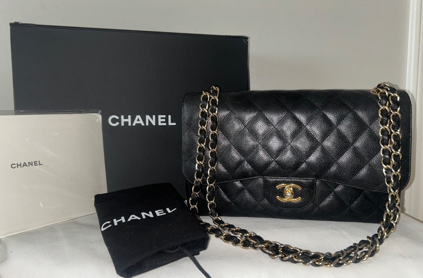 CHANEL Classic Jumbo Double Flap Quilted Caviar Leather Handbag Black/Gold