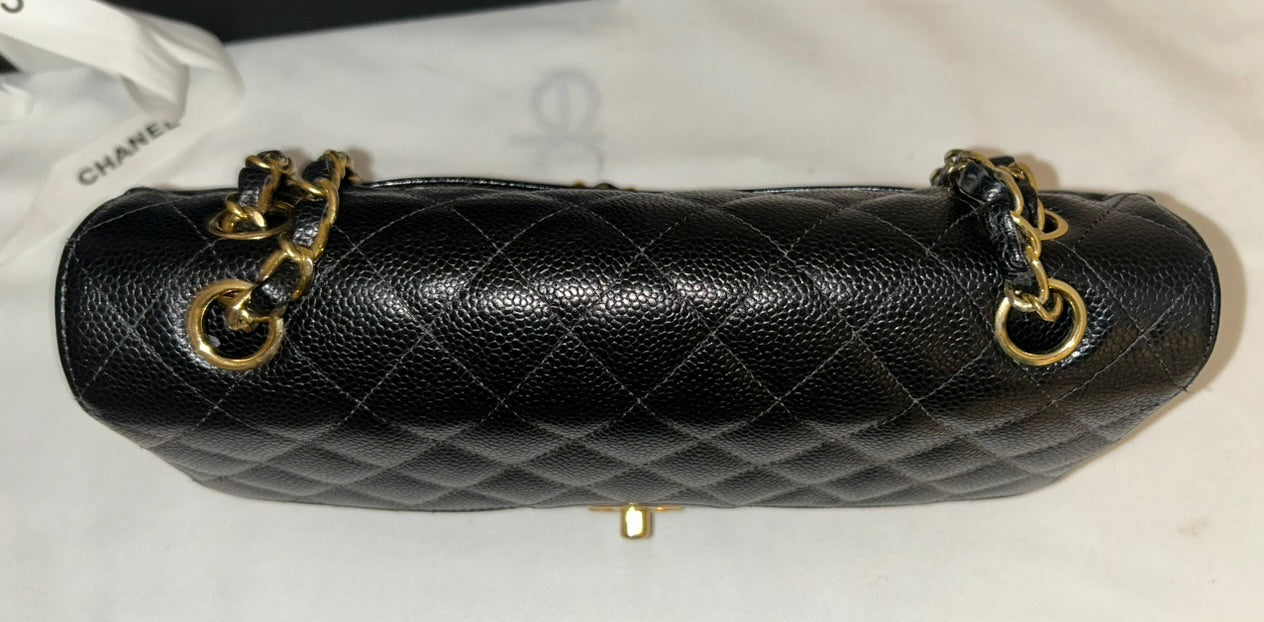 CHANEL Medium Classic Double Flap Caviar Quilted Handbag Black / 24k Gold