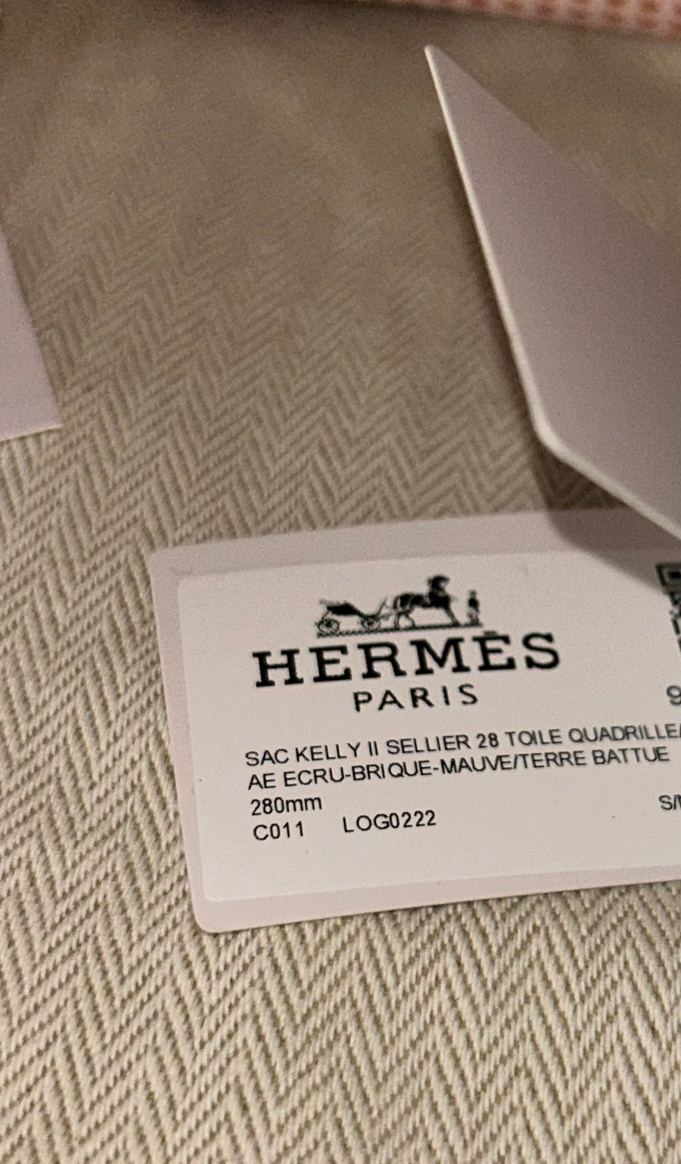 HERMÈS Kelly 28 Sellier Quadrille Toile Ecru/Brique Swift Palladium Hardware