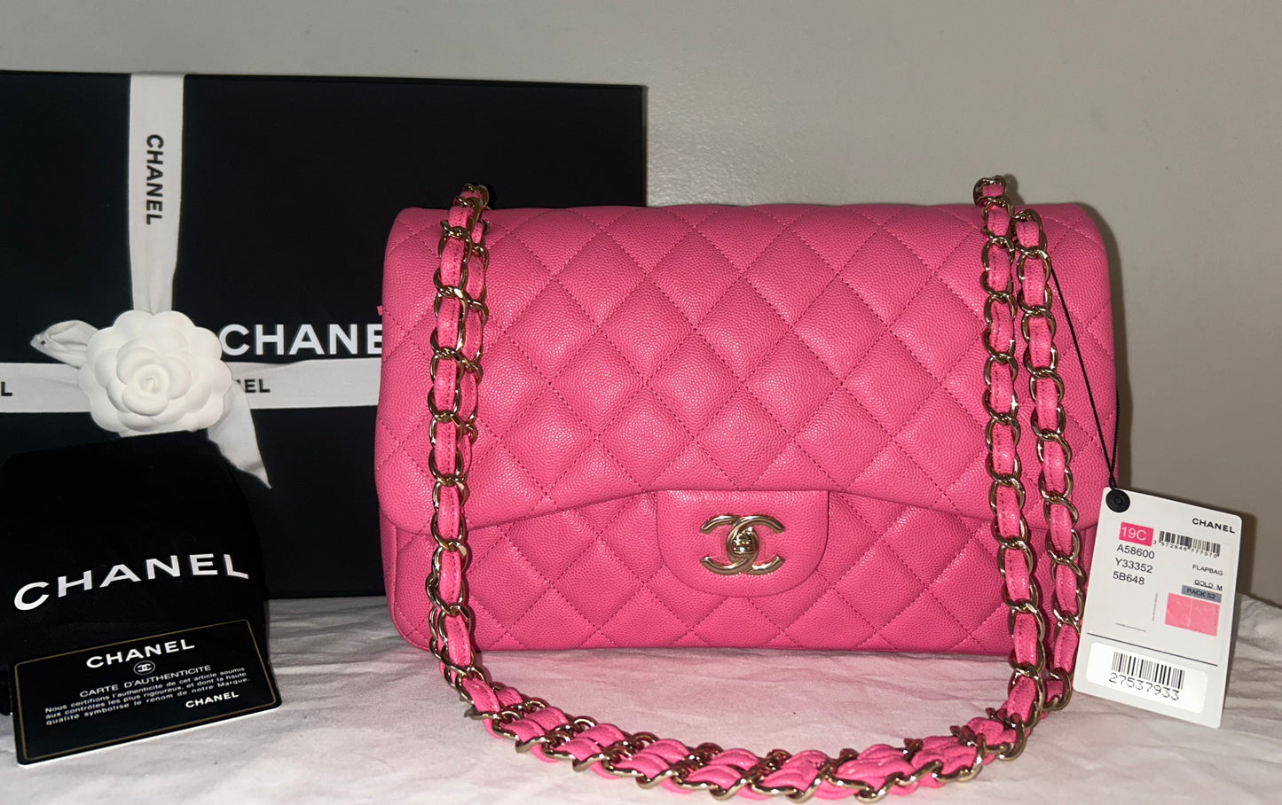 CHANEL Jumbo Double Flap Quilted Caviar Handbag Pink