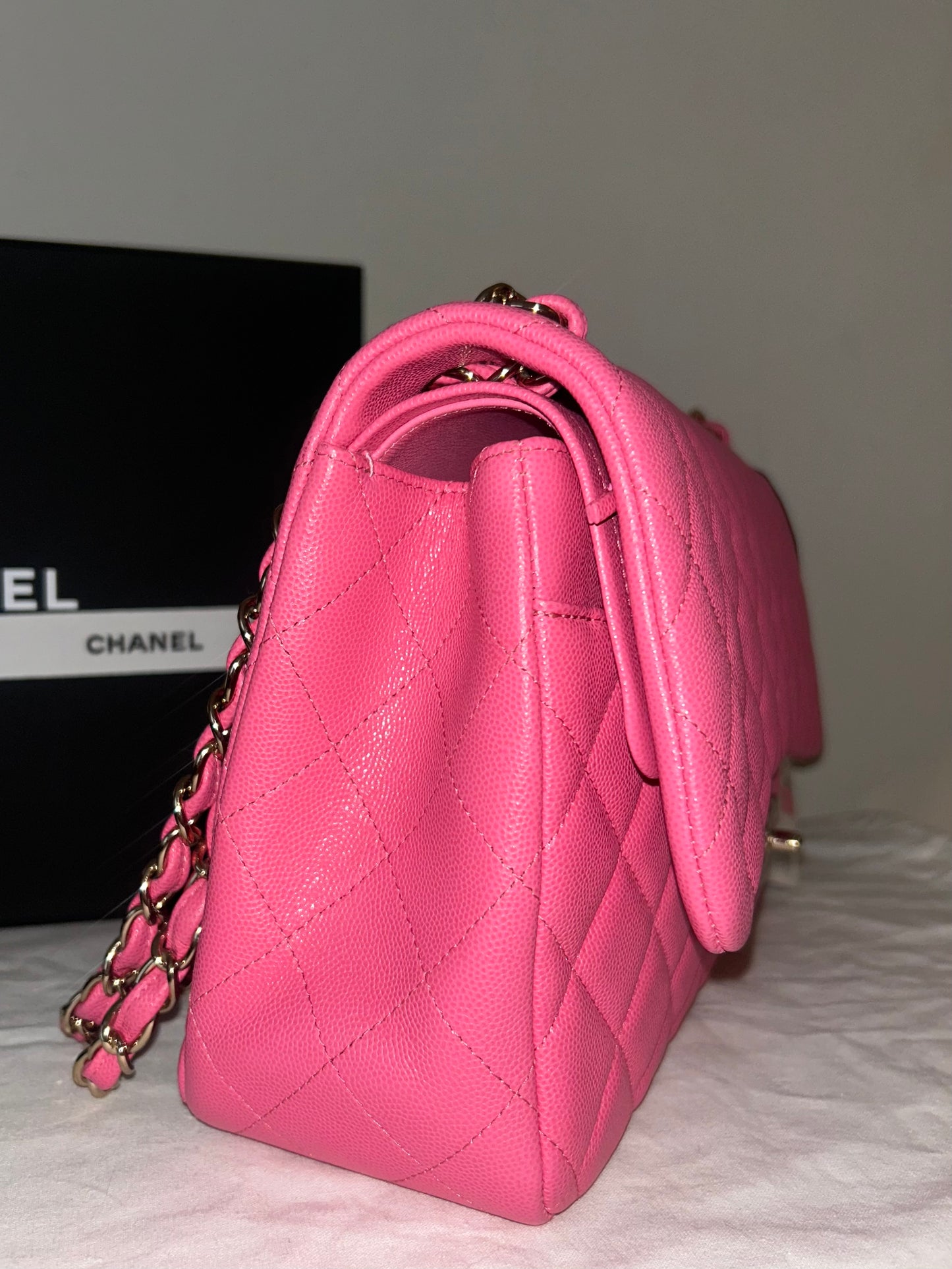 CHANEL Jumbo Double Flap Quilted Caviar Handbag Pink