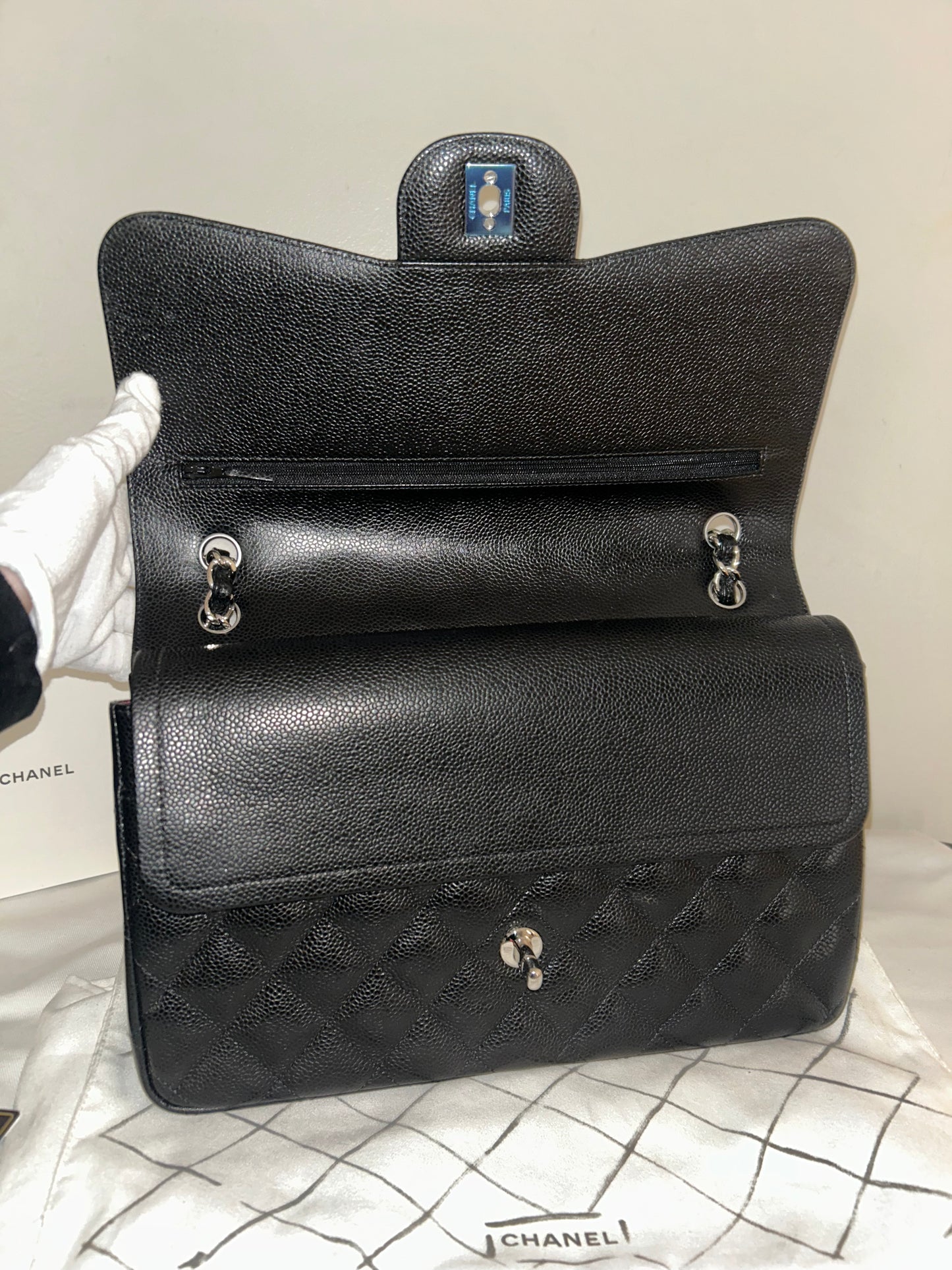 CHANEL Classic Jumbo Double Flap Quilted Caviar Leather Handbag Black