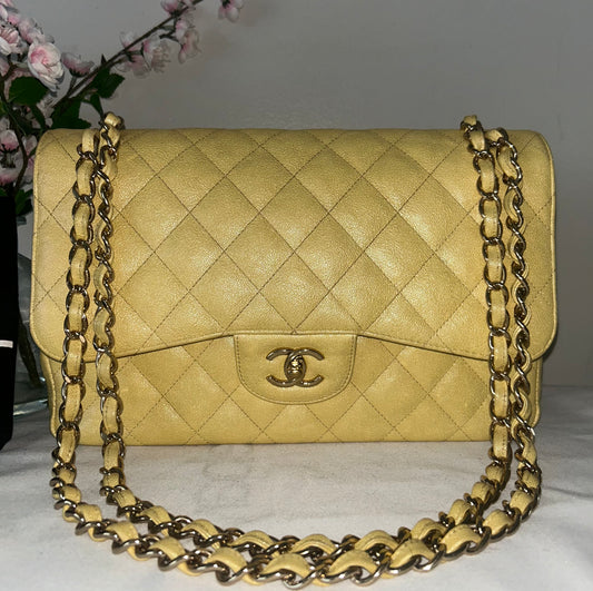 CHANEL 19S Jumbo Double Flap Quilted Caviar Handbag Iridescent Yellow