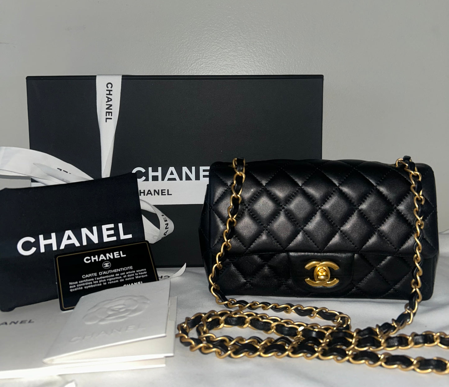 CHANEL Classic Mini Rectangular Flap Bag Quilted Lambskin Black / Gold