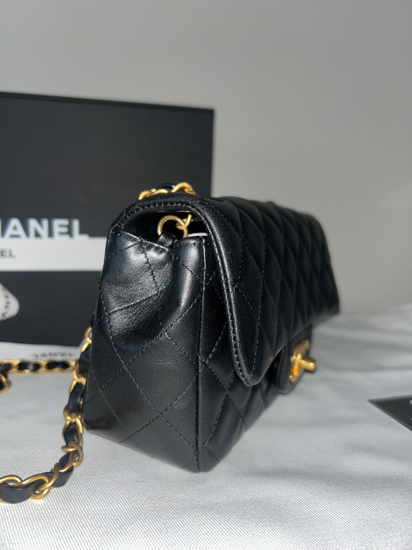 CHANEL Classic Mini Rectangular Flap Bag Quilted Lambskin Black / Gold