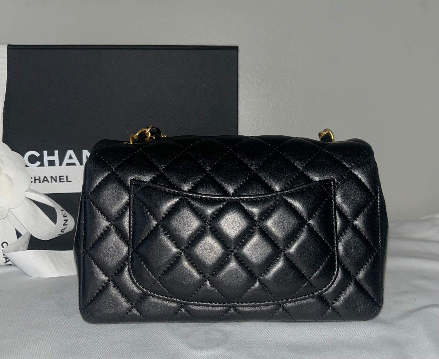 CHANEL Classic Mini Rectangular Flap Bag Quilted Lambskin Black / Gold