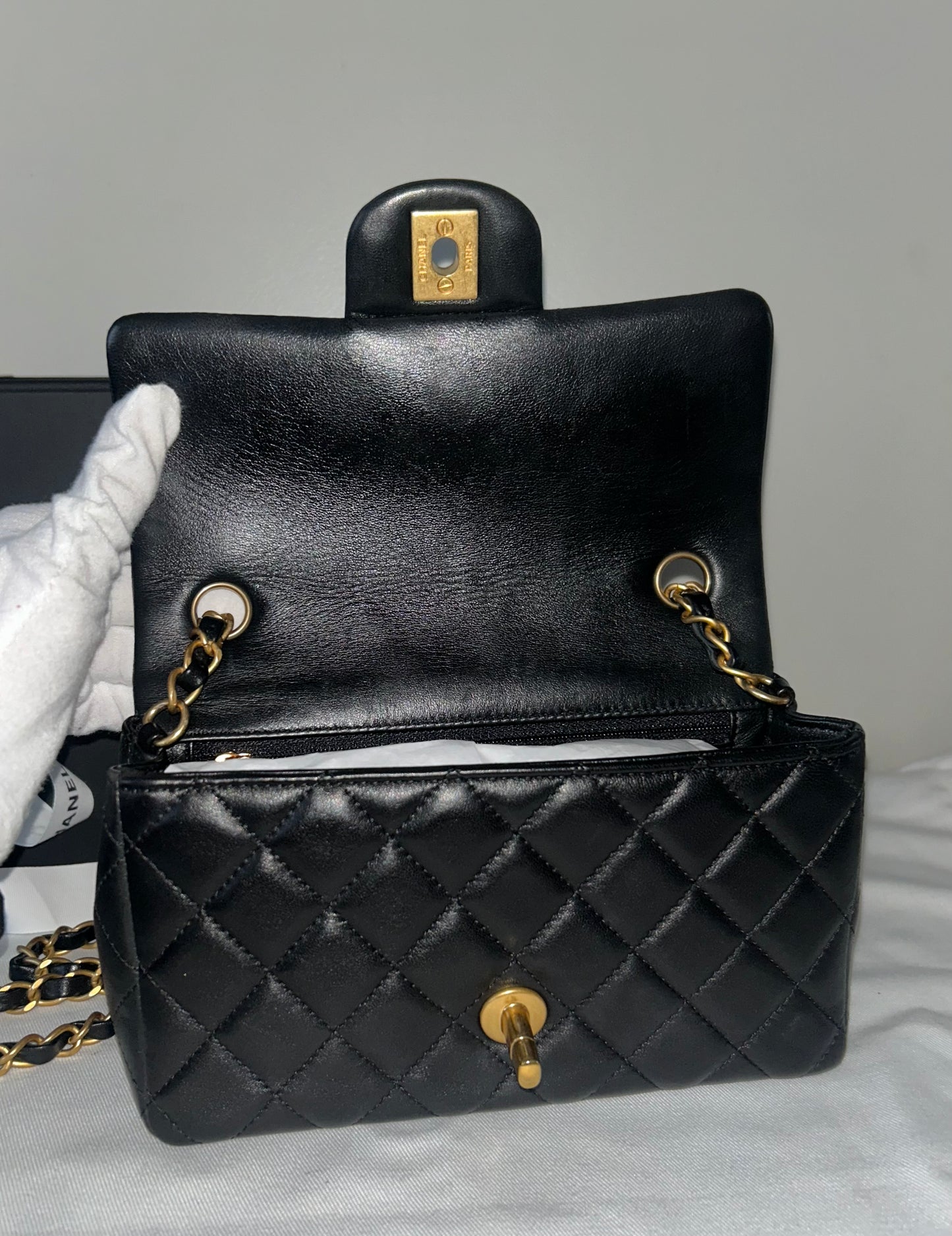 CHANEL Classic Mini Rectangular Flap Bag Quilted Lambskin Black / Gold
