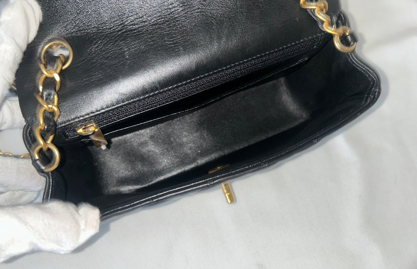 CHANEL Classic Mini Rectangular Flap Bag Quilted Lambskin Black / Gold