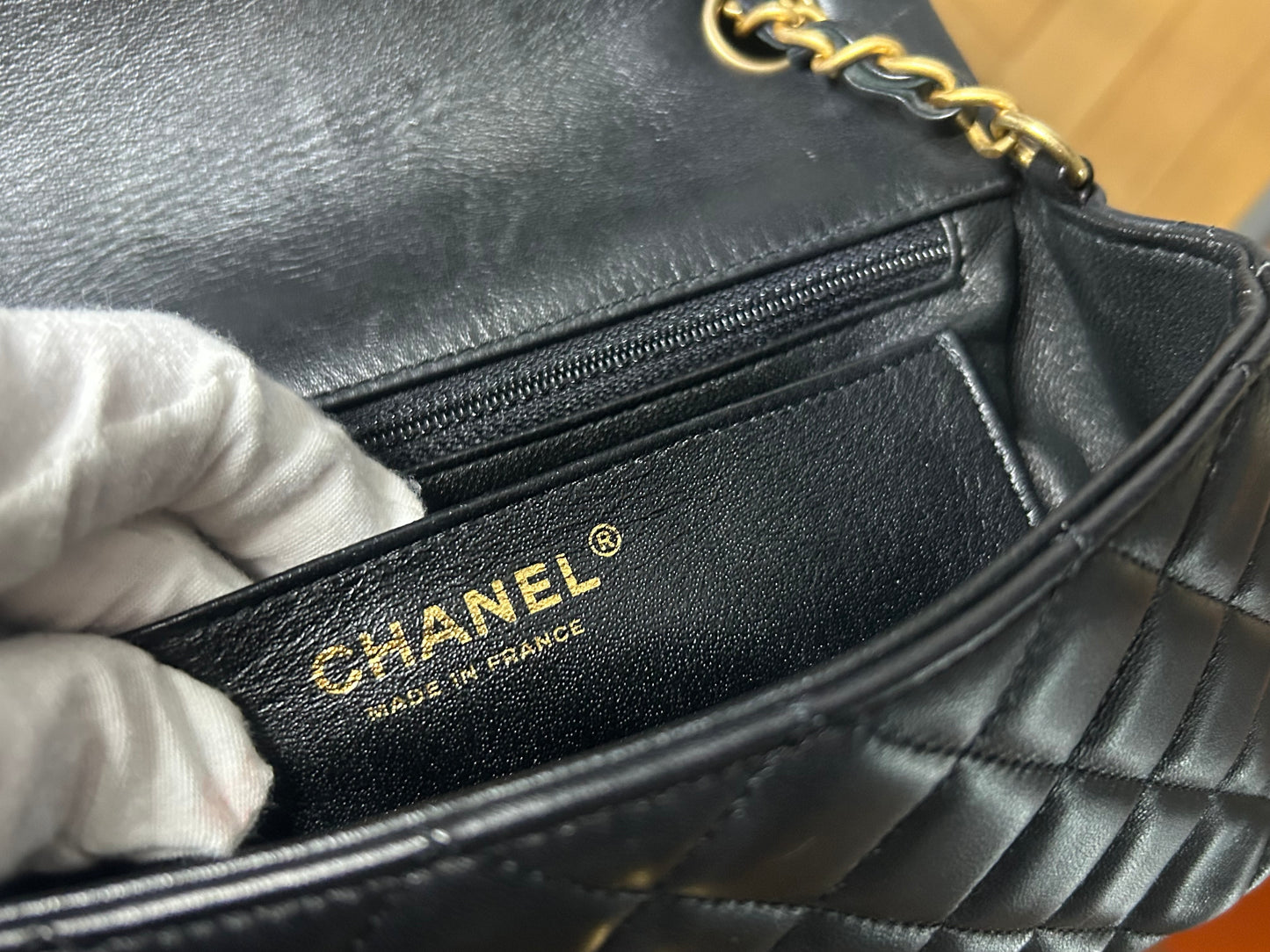 CHANEL Classic Mini Rectangular Flap Bag Quilted Lambskin Black / Gold