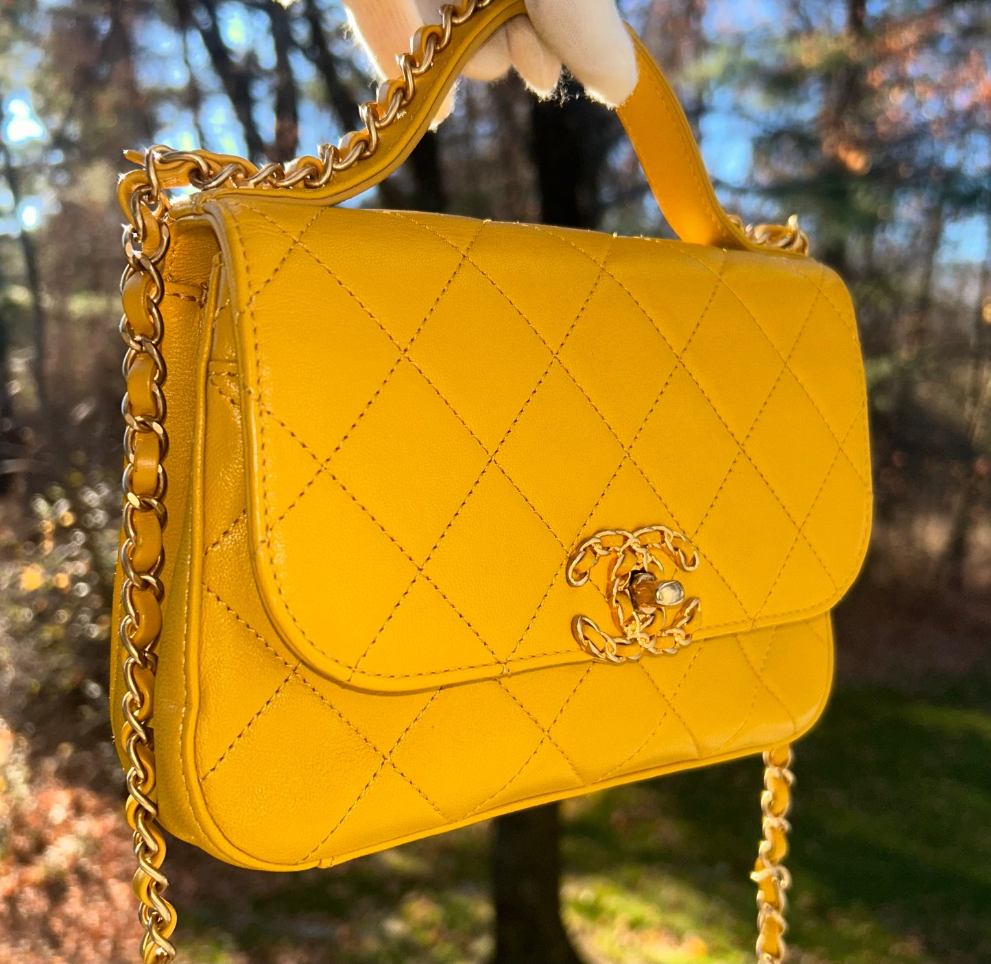 CHANEL 19 Small Chain Infinity Top Handle Bag Quilted Lambskin Leather Yellow