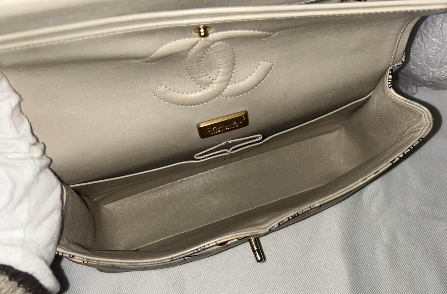 CHANEL Graffiti Newsprint Logo Medium Double Flap Lambskin Handbag Beige