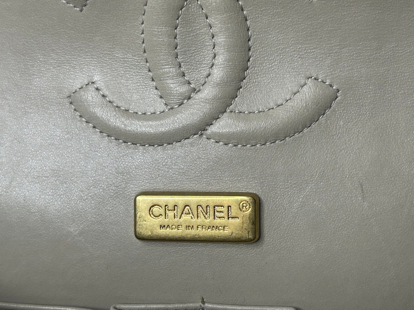 CHANEL Graffiti Newsprint Logo Medium Double Flap Lambskin Handbag Beige