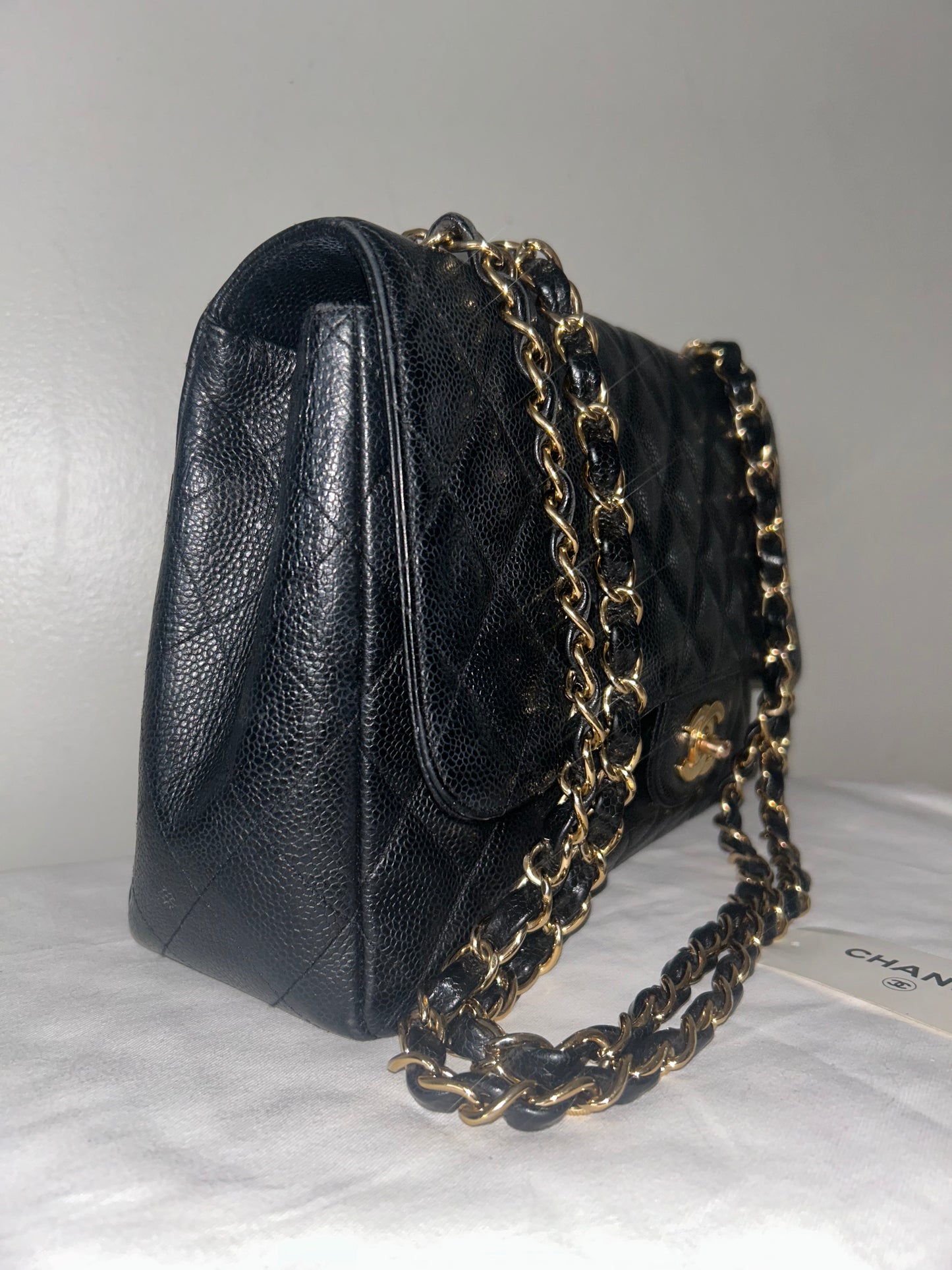 CHANEL Classic Jumbo Quilted Caviar Leather Handbag Black/Gold