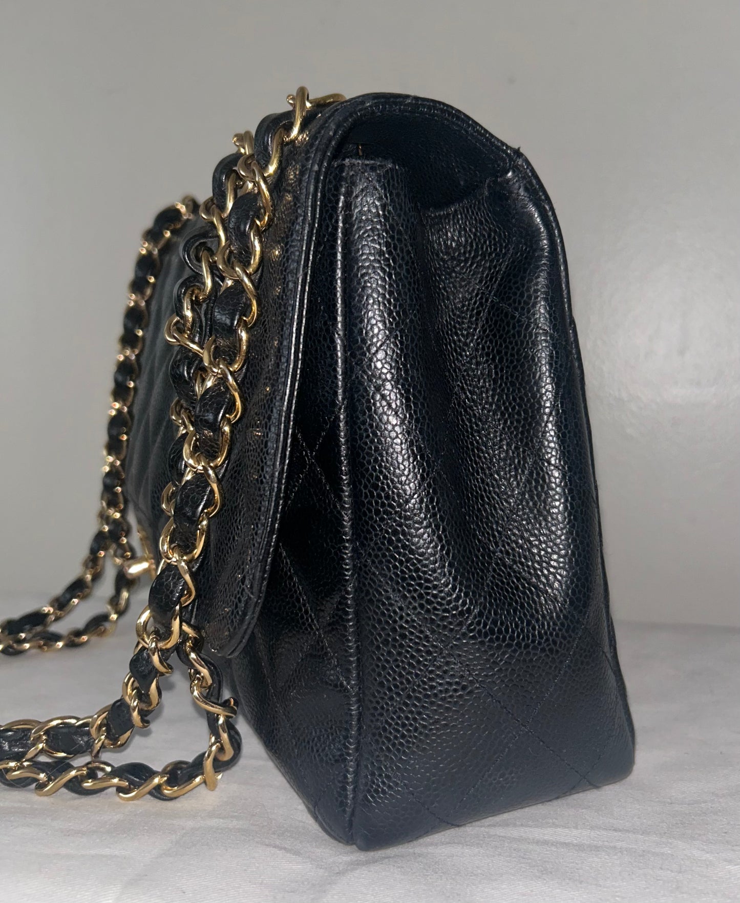 CHANEL Classic Jumbo Quilted Caviar Leather Handbag Black/Gold