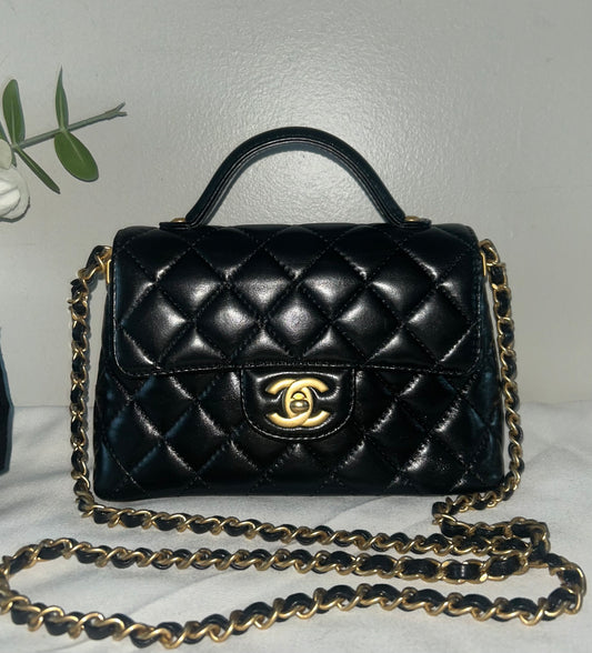CHANEL 25P Kelly Top Handle Flap Bag Quilted Lambskin Black / Gold Hardware