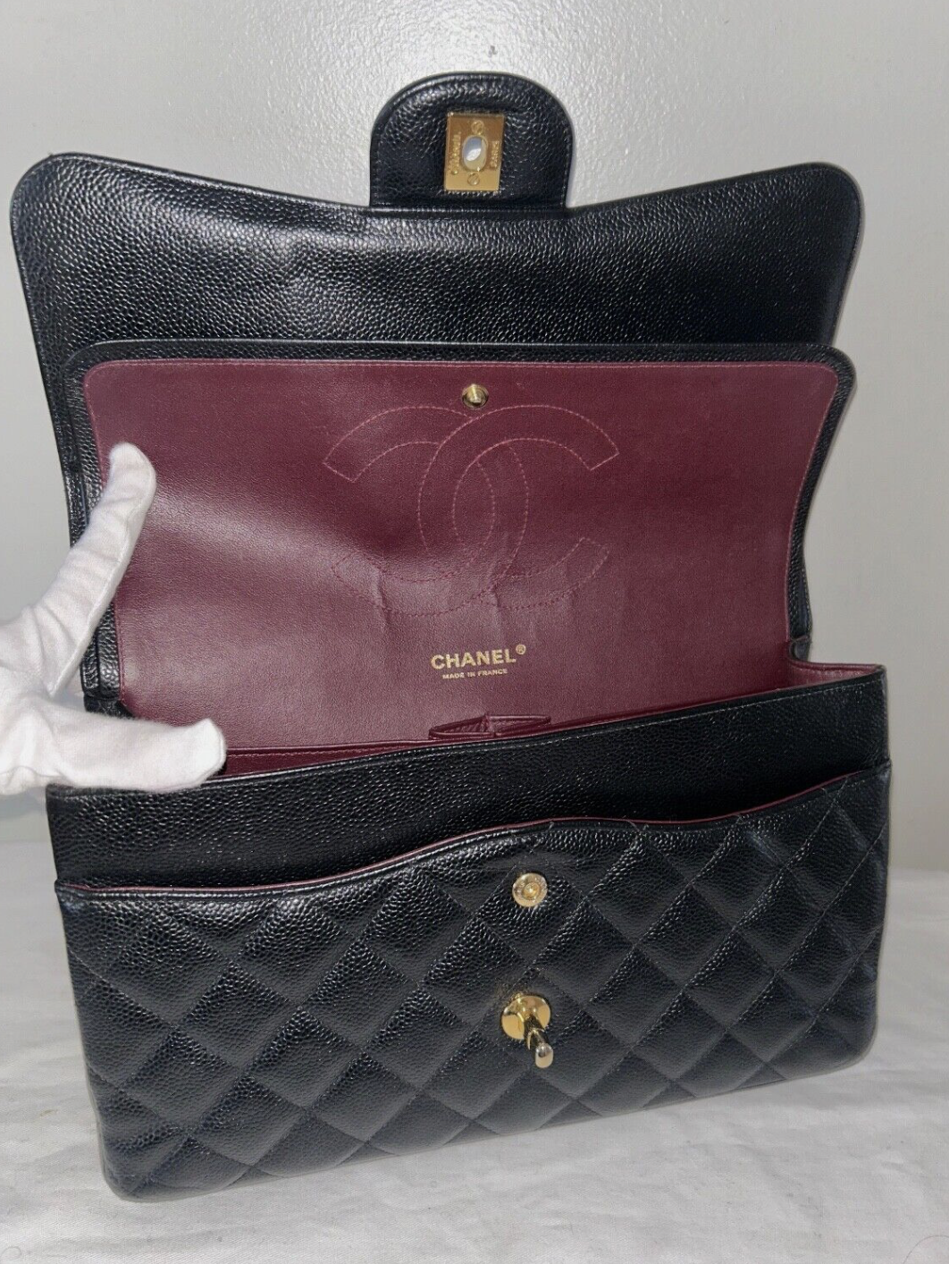 CHANEL Classic Jumbo Double Flap Caviar Leather Handbag Black/Gold