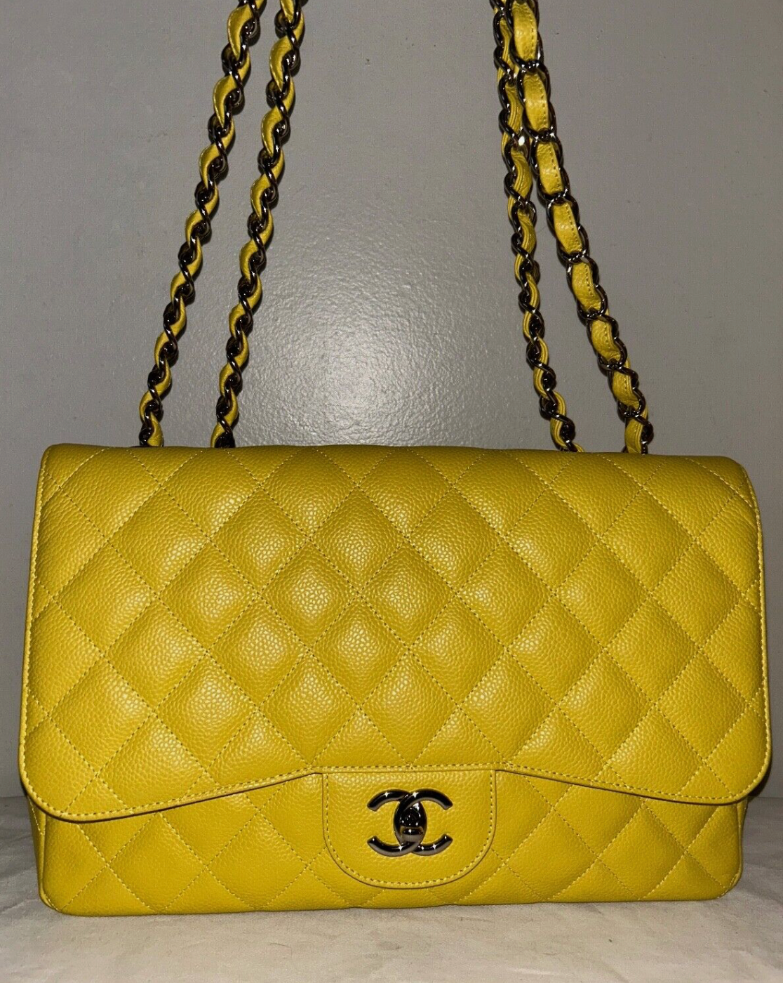 CHANEL Classic Jumbo Single Flap Caviar Leather Handbag Yellow