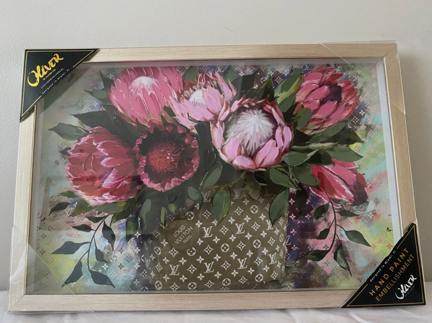 Oliver Gal LOUIS VUITTON Logo Trunk Flower Print Framed Wall Art 10" x 15"