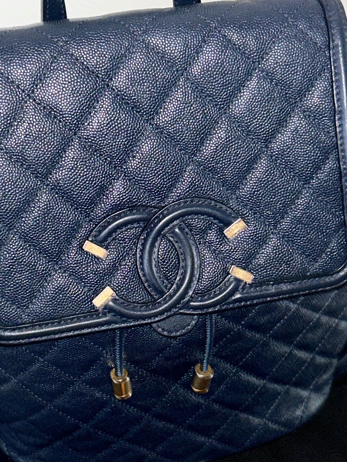 CHANEL Filigree Caviar Quilted Leather Backpack Navy