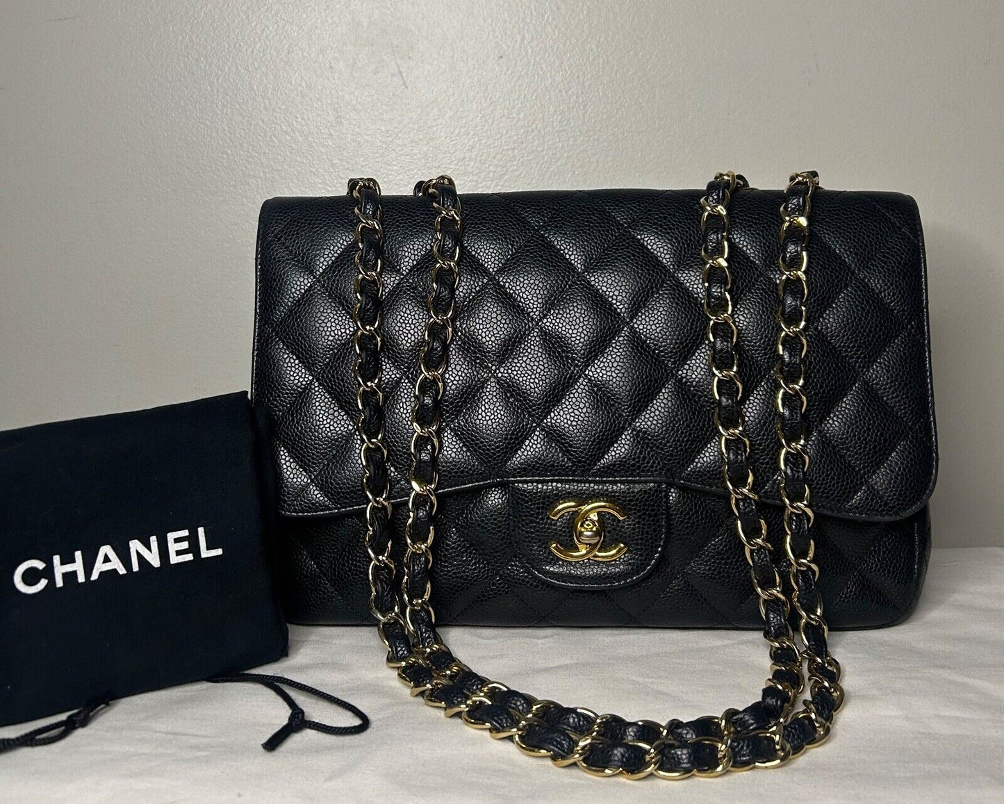 CHANEL Classic Jumbo Flap Quilted Caviar Leather Handbag Black/Gold Hardware