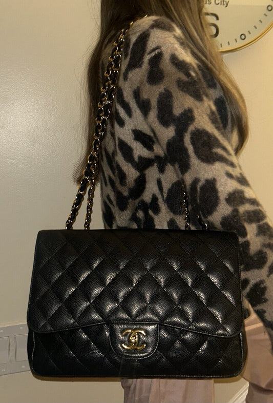 CHANEL Classic Jumbo Flap Quilted Caviar Leather Handbag Black/Gold Hardware