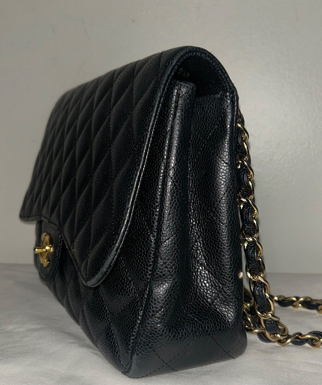 CHANEL Classic Jumbo Flap Quilted Caviar Leather Handbag Black/Gold Hardware