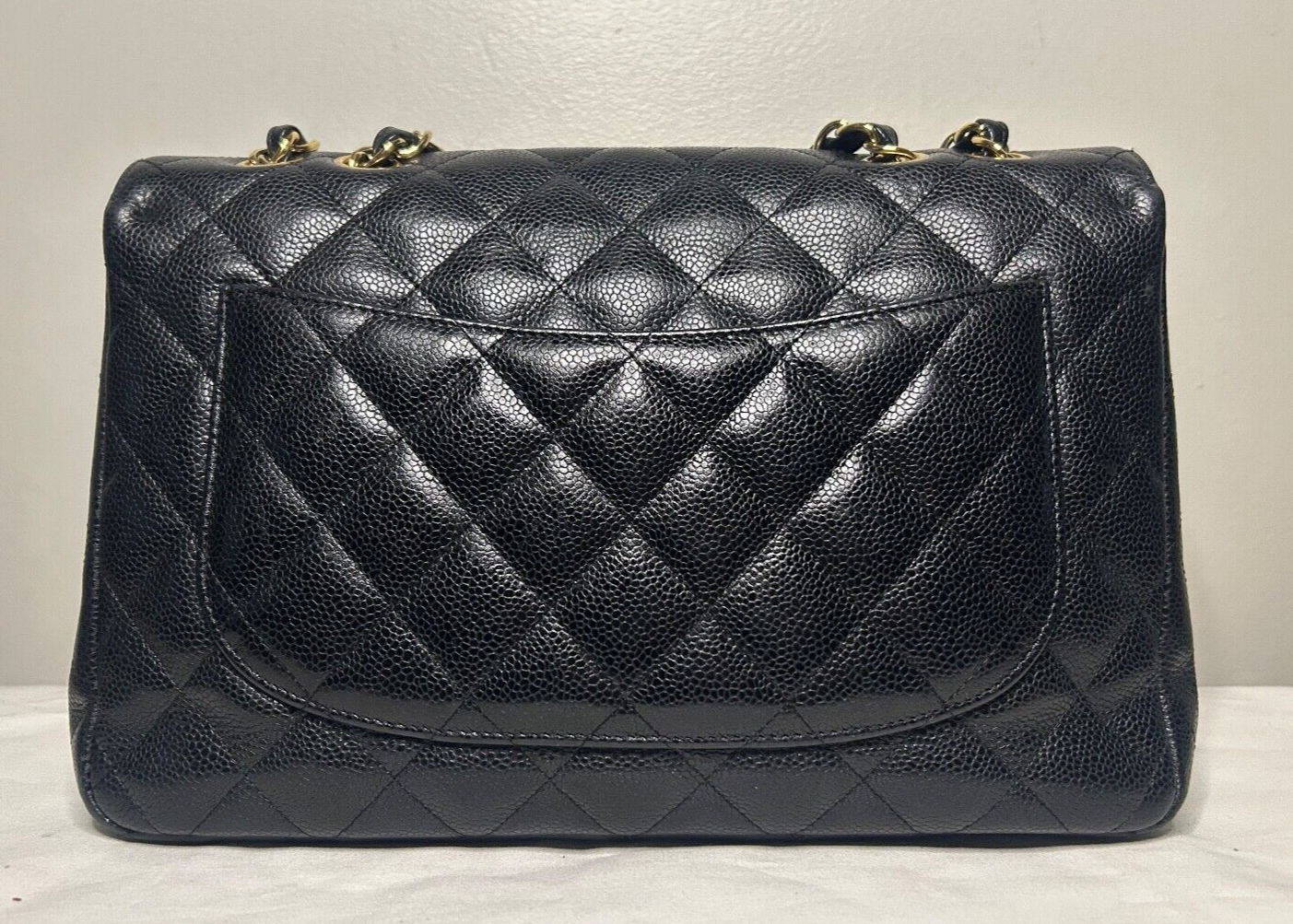 CHANEL Classic Jumbo Flap Quilted Caviar Leather Handbag Black/Gold Hardware