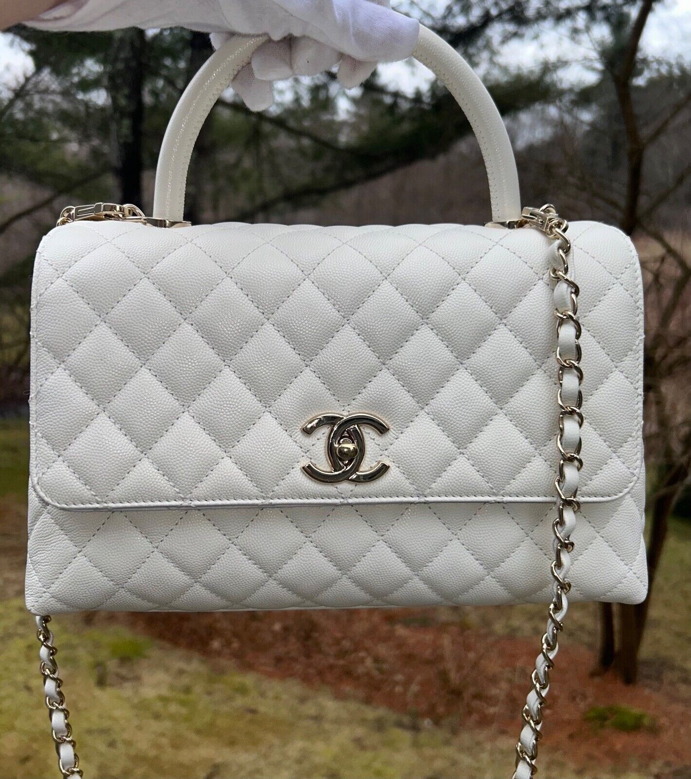 CHANEL 21A Quilted Caviar Coco Handle Flap Bag White/Champagne Gold Hardware